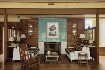 The wood-clad central hall of Kligerman’s Weekapaug family retreat