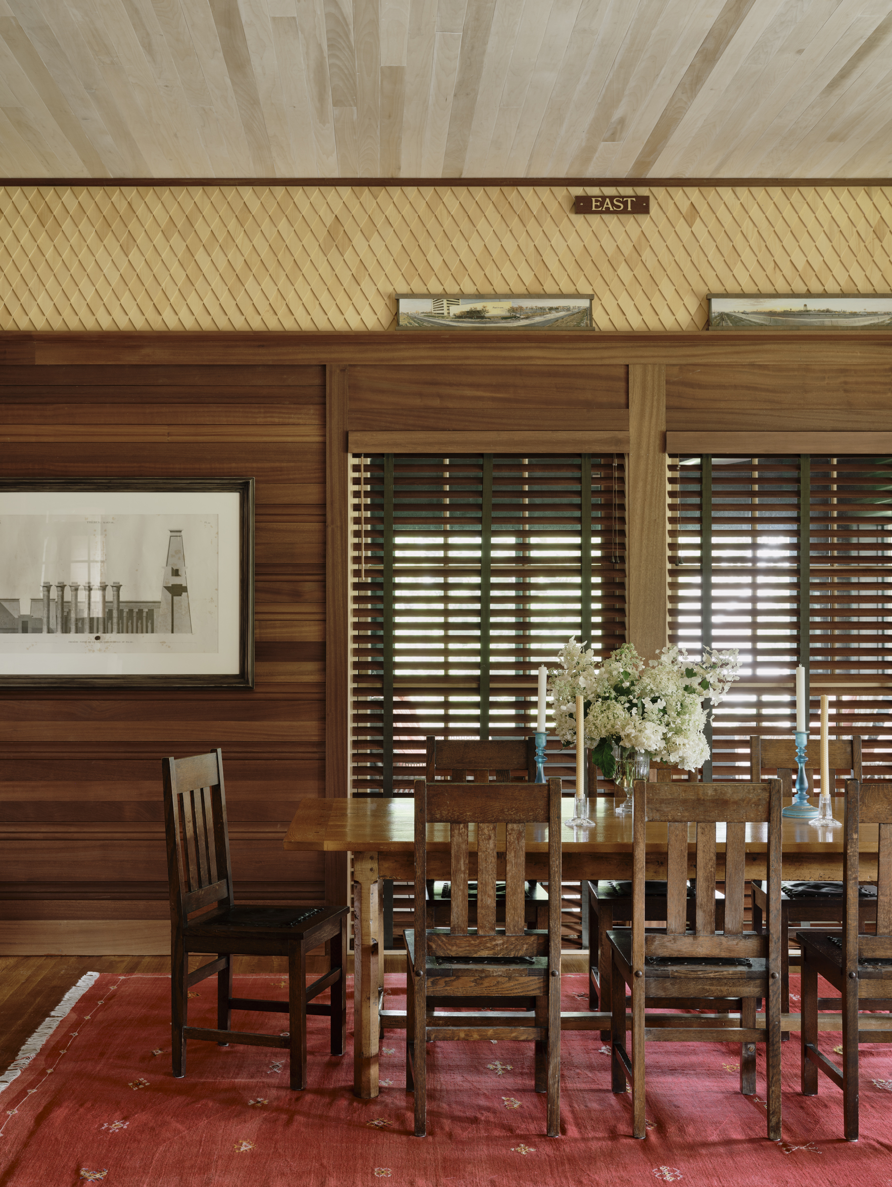 Mahogany paneling and a patterned shingle frieze wrap the dining hall