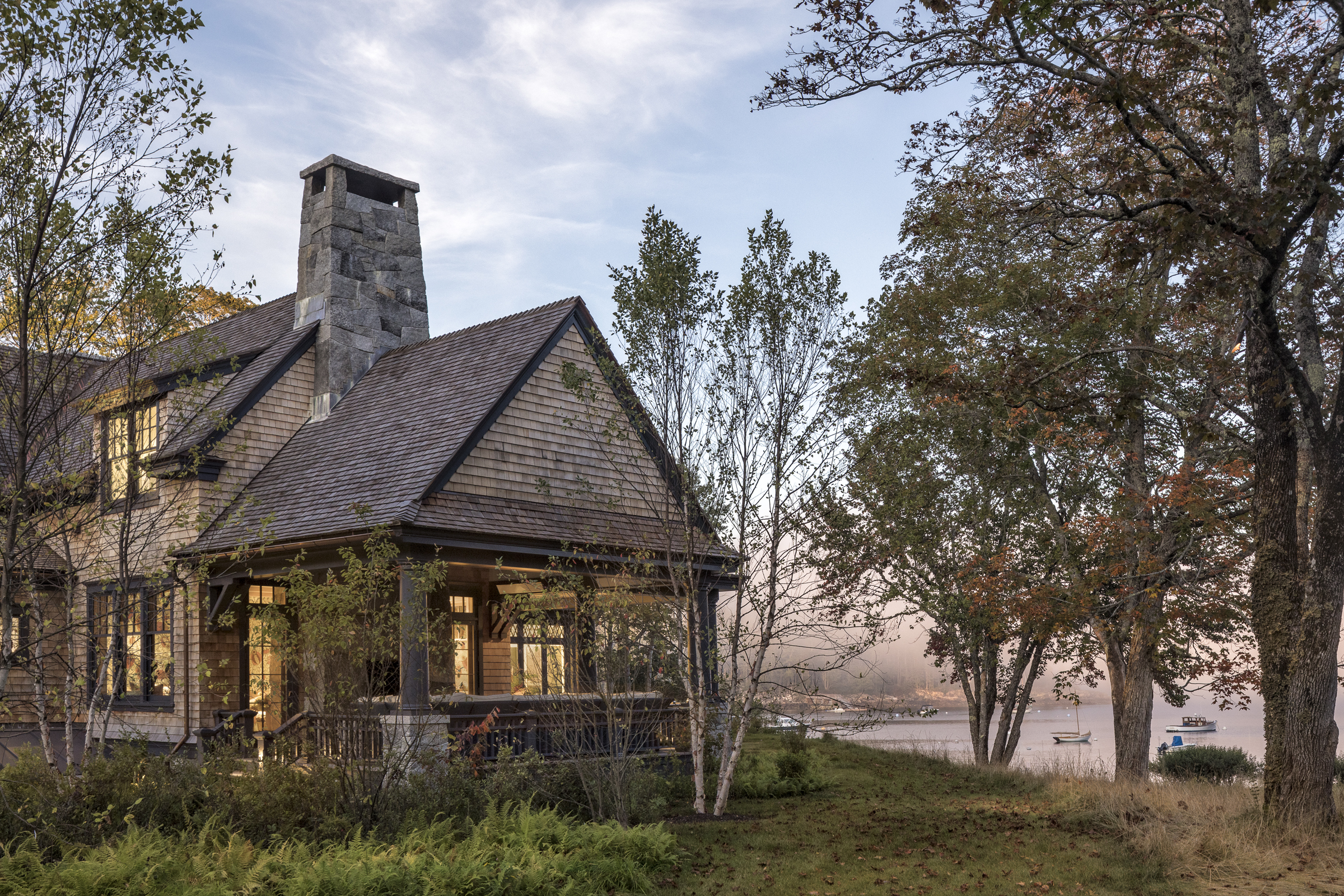 A cedar-shingled harbor residence by Peter Zimmerman Architects on the rocky Maine coast