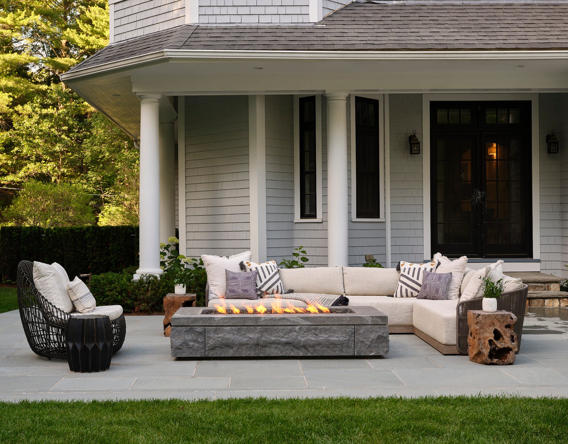 Outdoor seating around a rectangular fire pit at King’s Way